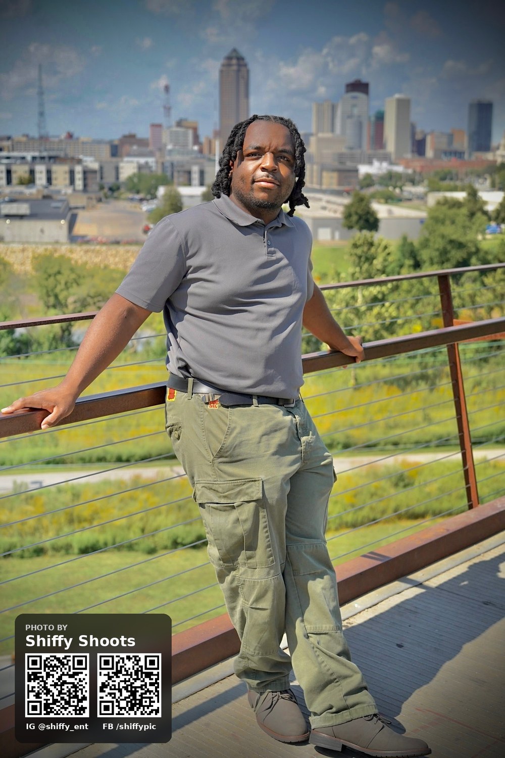 Mr. Crash with the Des Moines skyline behind him. Photo by Shiffy Shoots
